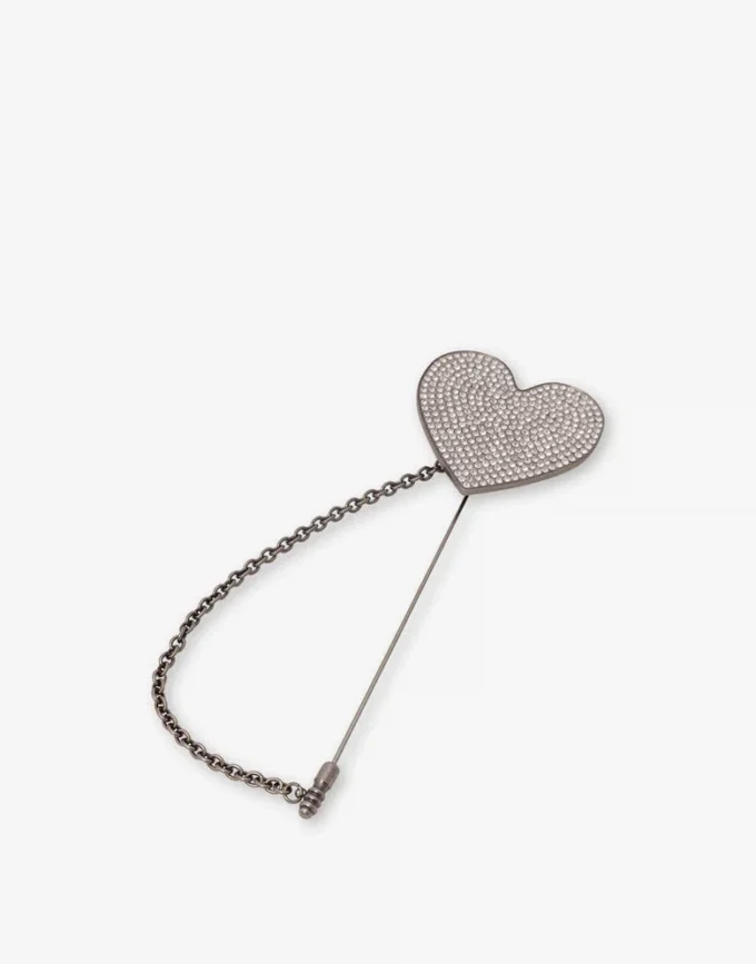 Broche metálico con pedrería