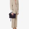 Moschino Tie Me Clutch: Exclusivo online Moschino Tie Me Clutch: Exclusivo online