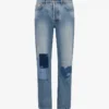 Pantalones de denim de algodón con parches Pantalones de denim de algodón con parches