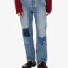 Pantalones de denim de algodón con parches Pantalones de denim de algodón con parches