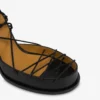 Sandalias altas con cordones hasta la pantorrilla