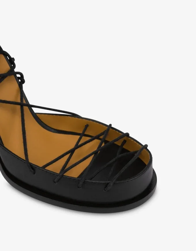 Sandalias altas con cordones hasta la pantorrilla